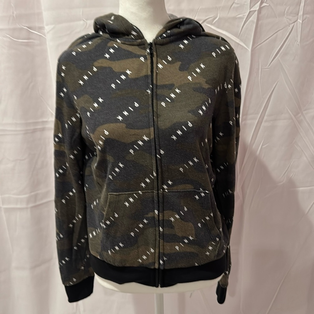 Pink small zip up sweatshirt with hood.
